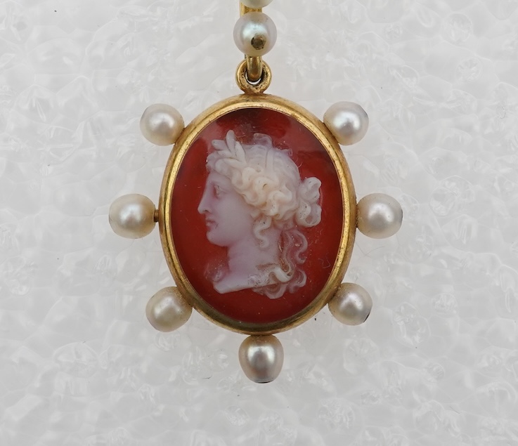 A late Victorian hardstone cameo and pearl pendant, late 19th century
